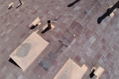 close-up view of shingled roof used for roof inspections and assessments
