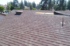 close-up of shingled roof showing installation details for roof inspections and assessments