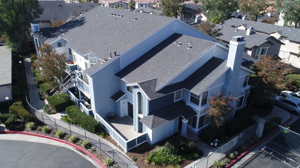 aerial photo of multi family dwelling focused on roof